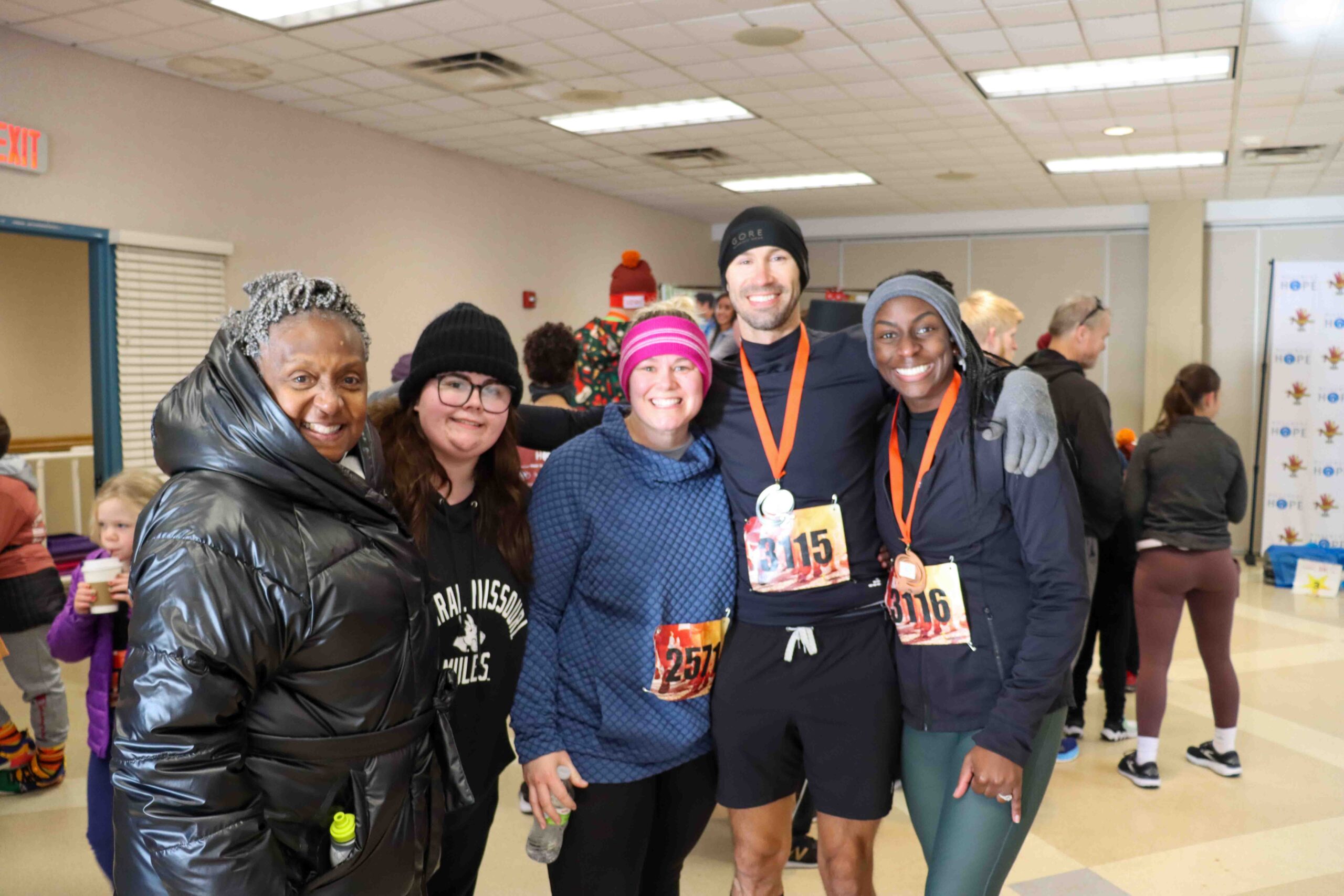 Runners celebrating their win